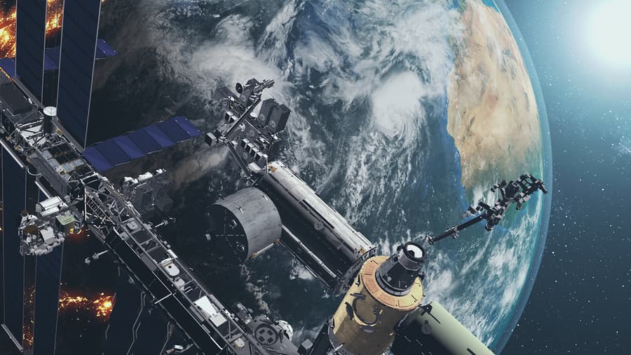 Close up of ISS orbiting realistic Earth globe. International Space Station rotate above planet surface with mainland and ocean. 3d render animation. Elements of this media furnished by NASA.